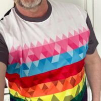 Andrew wearing the Pride geometric runinclusive t-shirt