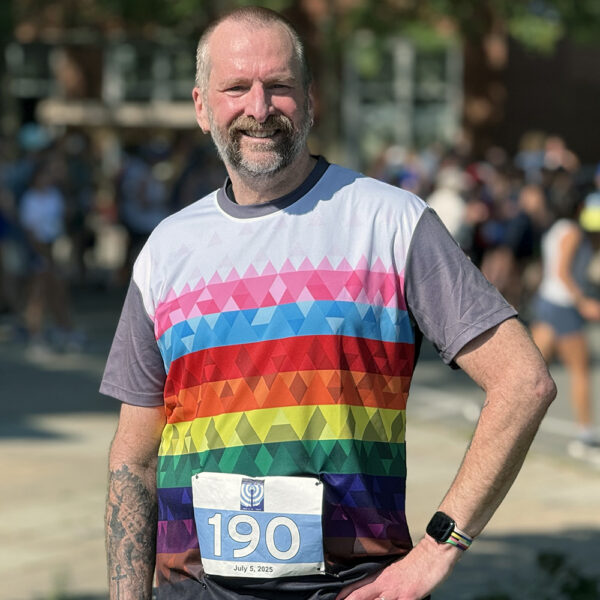 Kurt wearing our Pride Geometric t-shirt